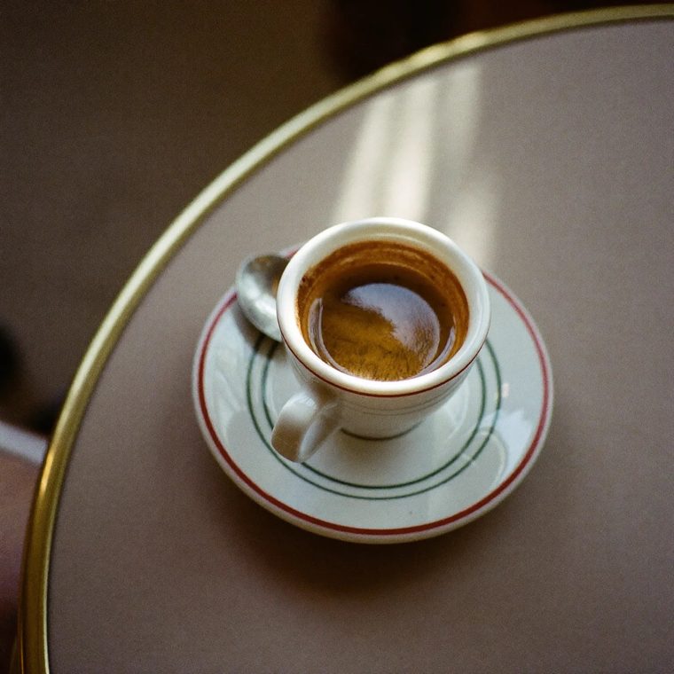 An espresso in a small white cup